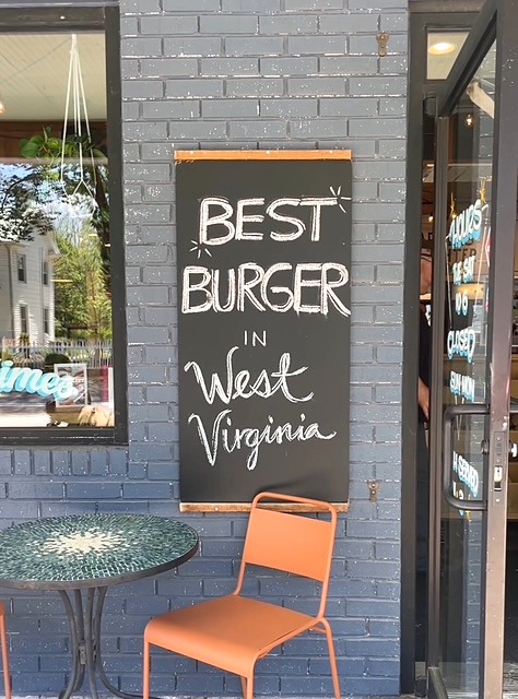 A sidewalk sign reading Best Burger in West Virginia